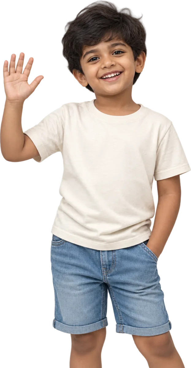 A boy of about five waving, in a cream T-shirt and denim shorts.